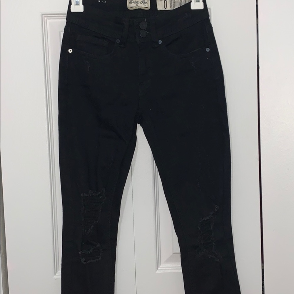 black ripped jeans